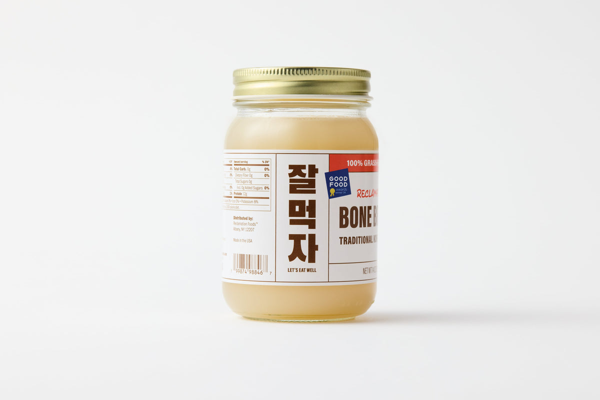 Left sideview of jar of Reclamation Korean-Style Beef Bone Broth on a white background