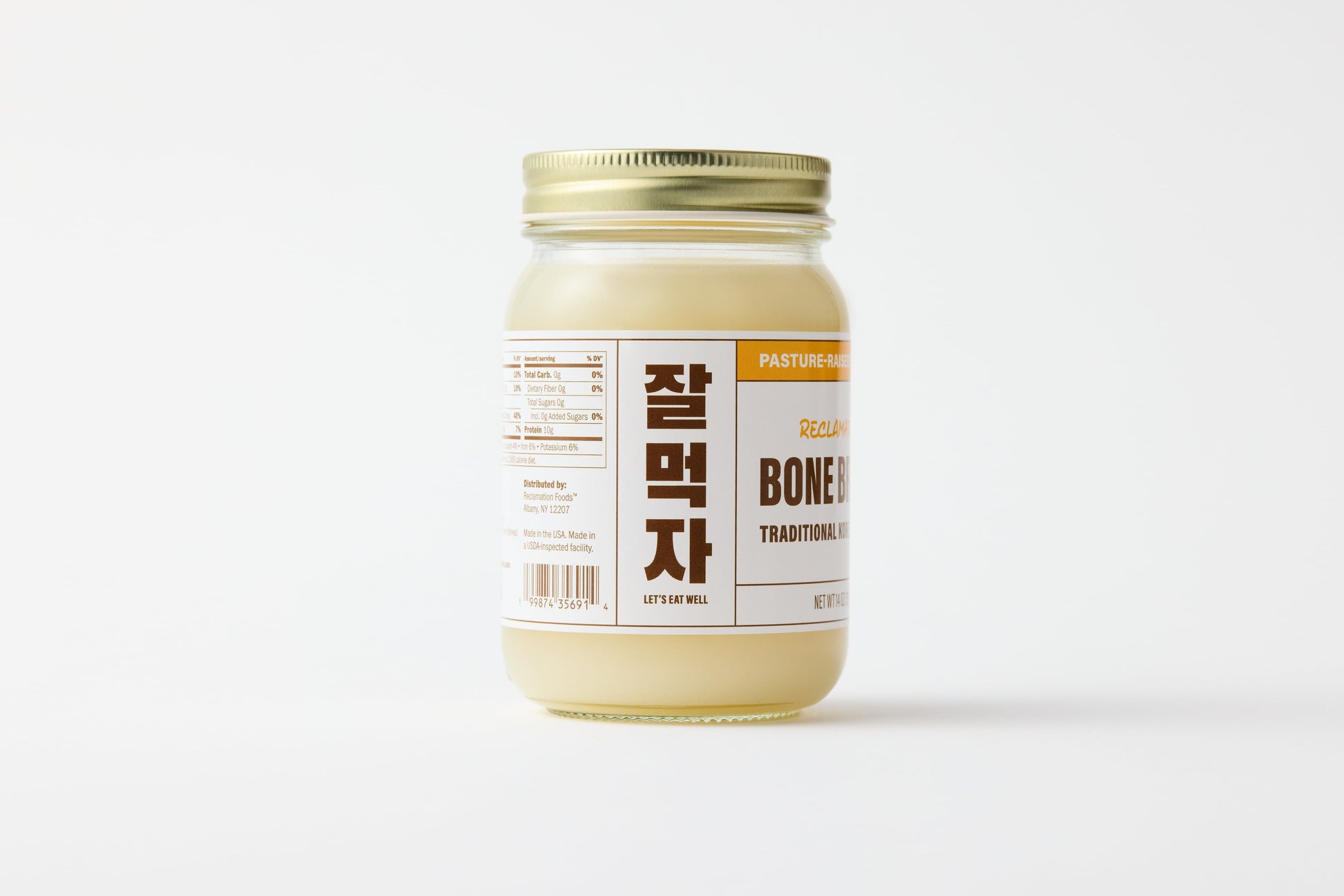 Sideview of jar of Reclamation Korean-Style Chicken Bone Broth on a white background