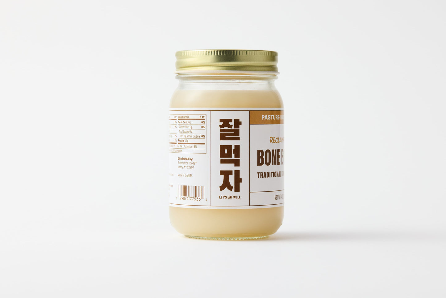 Sideview of jar of Reclamation Korean-Style Pork Bone Broth on a white background