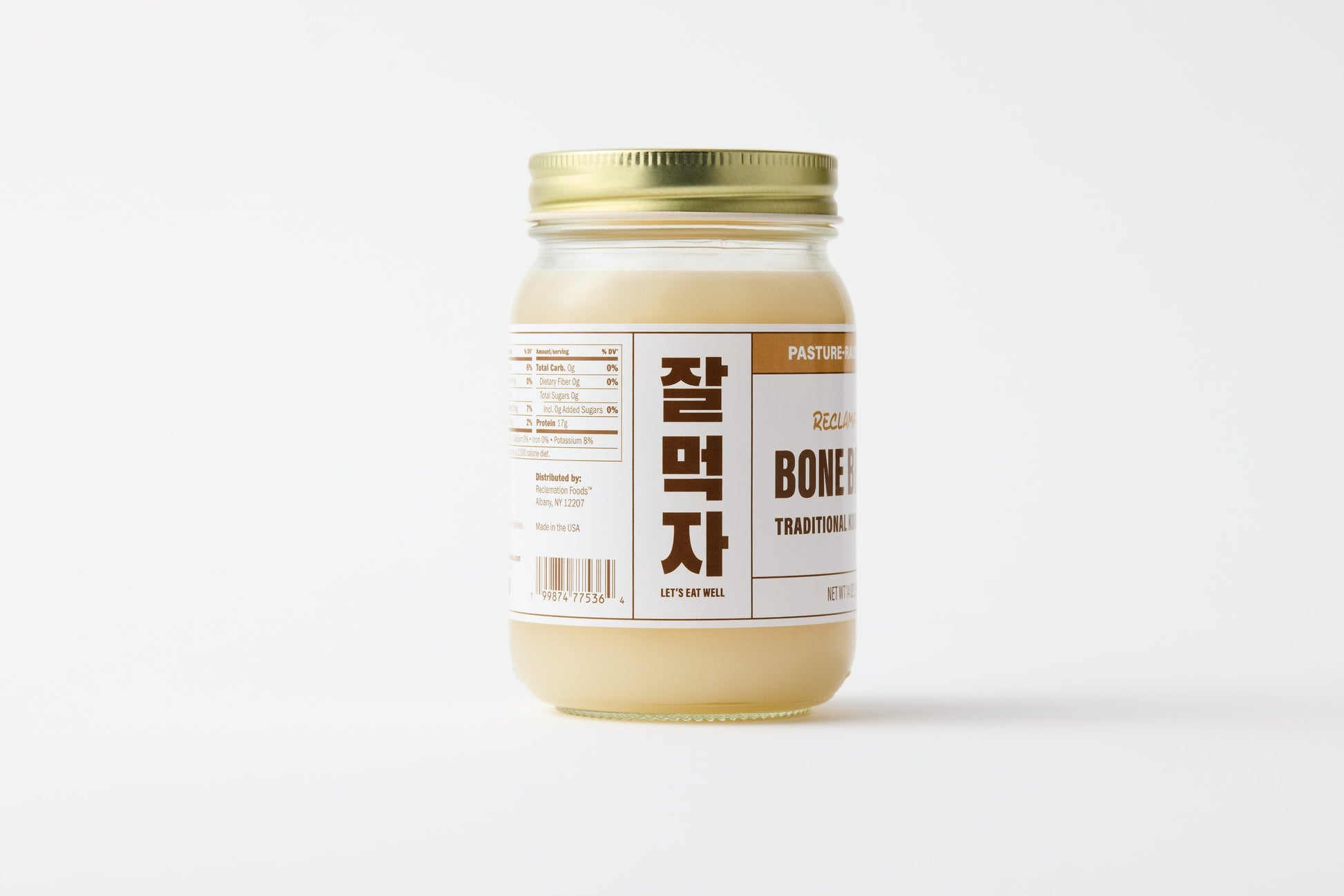 Sideview of jar of Reclamation Korean-Style Pork Bone Broth on a white background